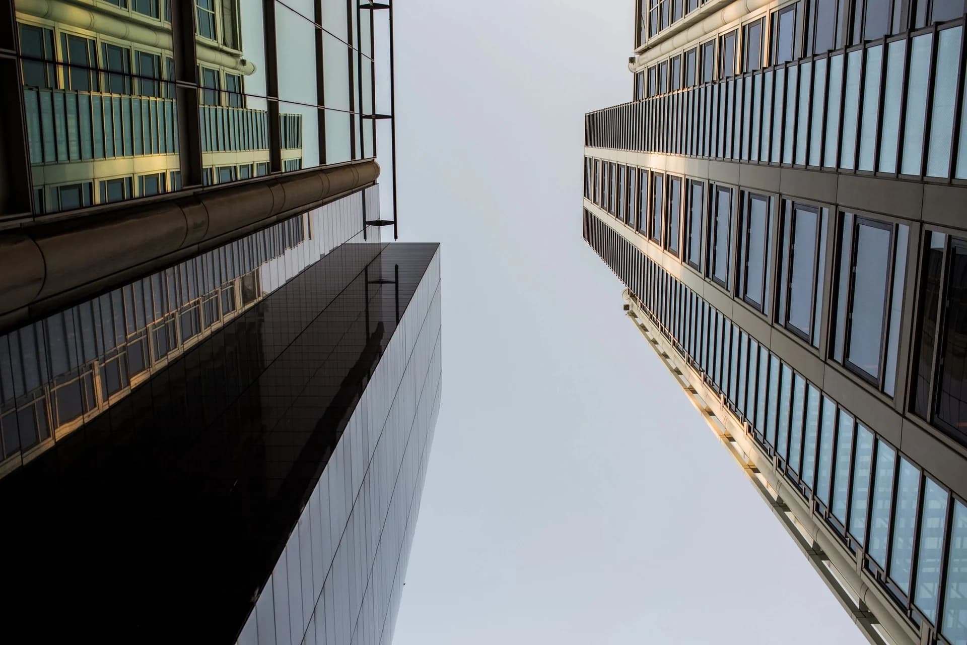 Contemporary building facades viewed from below, used as representative architectural photography