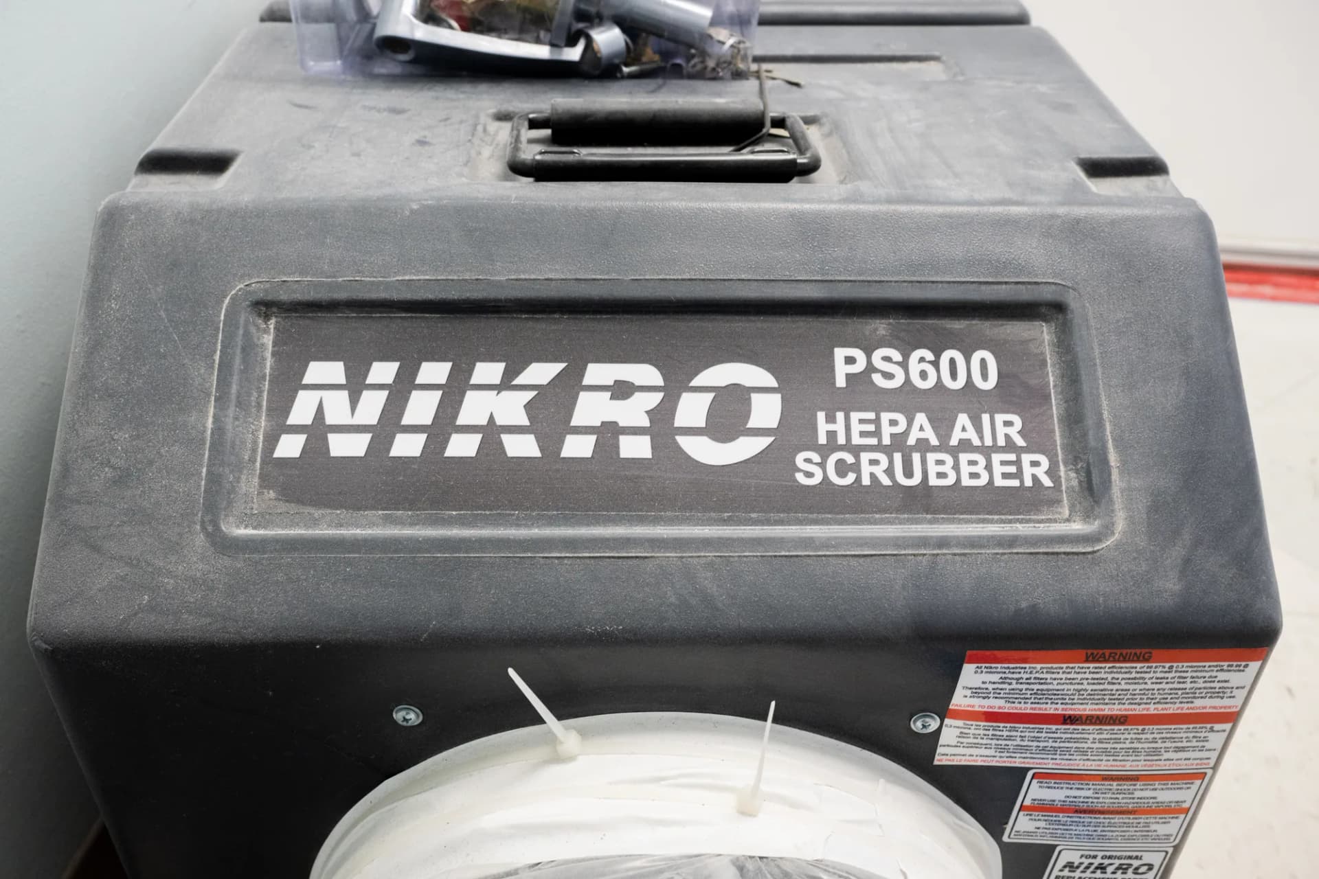 Air-control equipment supporting contained work inside an occupied medical-office environment
